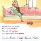 Ihr Welpe hat sie geweckt. Mit einem Hunde-Kuss. Mimi will sich anziehen, doch Balu möchte lieber spielen.  
Ein Mädchen sitzt im Bett mit einem Welpen, daneben Hausschuhe.