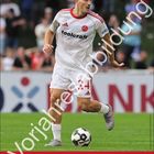 Großer Text: "Vorjahresabbildung". Oben: "Luka Lochoshvili". Unten rot: Kalender März, 1. FCN Logo, "Der Club". Spieler in Aktion.