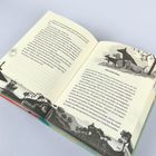 Zwei beschriebene Buchseiten. Überschrift: "DAS KOPFGELD". Illustration: Zwei Hunde, einer sitzend, einer stehend im Hintergrund.
