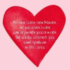 Weißer Text auf rotem Herz: "Mit einem Lächeln, einem Blümchen, mit ganz kleinen Sachen kann ich jemanden glücklich machen..."