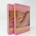 Zwei Bücher mit pinkem Cover. Titel: "UNSHAME". Autor: Louisa Dellert. Text: Wie wir uns von Idealen befreien und den weiblichen Körper wertschätzen.