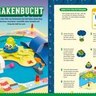 Titel: "KRAKENBUCHT". Anleitung für ein Spiel mit Papp-Oktopus und Bauteilen auf blauem Spielfeld.