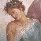 Zahlenfolge unten: 3, 1 bis 31. Fresko einer Frau mit Blumenkranz im Haar, nachdenklich und in Toga gehüllt.