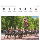 Mai | Juni, 22. Woche, Wachablösung in London. Soldaten in roten Uniformen reiten auf schwarzen Pferden.