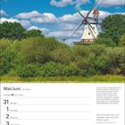 Mai/Juni Kalenderblatt mit Spruch: "Den Wind kann man nicht verbieten, aber man kann Mühlen bauen." Windmühle im Grünen.