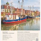 Küstenwandern am Wattenmeer. Schiffe im Hafen vor Backsteinhäusern. Deutschland, Niedersachsen, Ostfriesland. Januar.