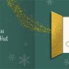 „1 Die Frau mit dem Hut“ in Weiß auf Grün mit goldenen Akzenten. Illustration eines spitzen Huts. Schneeflocken als Dekor.