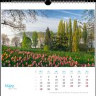 "Kalenderblatt März. Bild: Frühlingslandschaft mit blühenden Tulpen, Bäumen und einem See im Hintergrund."