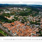 Kalenderseite für März mit Bild einer Stadtansicht. Unten sind Daten und Angaben zu Feiertagen.