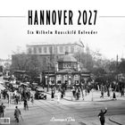 "HANNOVER 2027 Ein Wilhelm Hauschild Kalender" steht oben. Schwarz-weißes Stadtbild mit Menschen, Autos und Straßenbahnen.