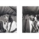 Links unten "102 • GEORGE MICHAEL", rechts unten "1986 • 103". Zwei lachende Männer, einer mit Gitarre, Zelt im Hintergrund.