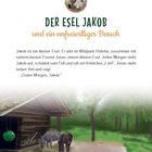 „DER ESEL JAKOB und ein unfreiwilliger Besuch“. Zwei Esel vor einem Holzhäuschen im Grünen. Logo mit Eselköpfen.