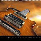 Kalenderseite März, Nahaufnahme einer E-Gitarre mit verschwommenem Hintergrund, Zahlenreihe unten.