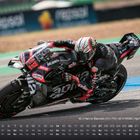 Text: "12 | Marco Bezzecchi | ITA | 12.11.1998 | Aprilia Racing 3". Ein Motorradfahrer auf einer Rennstrecke in Aktion.