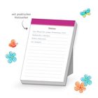 Notizblock mit Texten: "Notizen", "Opa Bernd hat morgen Geburtstag (75)!", "Grillsachen einkaufen", umgeben von Schmetterlingen.