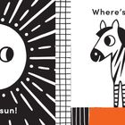 Links: "Here's a sun!" Ein lachendes Gesicht in einer strahlenden Sonne. Rechts: "Where's the zebra?" Ein stilisiertes Zebra.