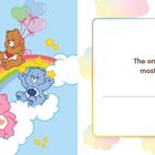 Text: "The one thing we have most in common is". Illustration: Bunte Teddybären auf Wolken mit Regenbogen.