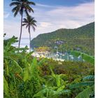 36 September, Mo 06, Di 07, Mi 08, Do 09, Fr 10, Sa 11, So 12. Tropische Bucht mit Palmen und Segelbooten im Hintergrund.