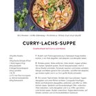Curry-Lachs-Suppe Rezept mit Mie-Nudeln, Curry, Lachs und Kokos. Bild einer Schüssel mit Suppe, daneben Korianderblätter.