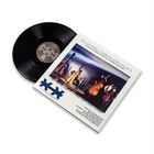 Schallplatte von Kelan Phil Cohran and Legacy, Cover zeigt Musiker mit Instrumenten.