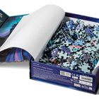 Text: "ANNE STOKES", daneben Beschreibung und Illustration eines Drachen. Puzzlebox mit Puzzleteilen.