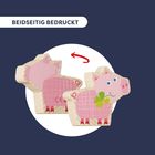 Text: "BEIDSEITIG BEDRUCKT". Zwei hölzerne Schweine mit rosa Muster, eines trägt ein grünes Kleeblatt.