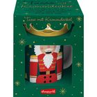 "Tasse mit Kronendeckel" in festlicher Verpackung mit Nussknacker-Design auf der Tasse.
