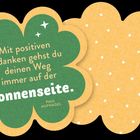 „Mit positiven Gedanken gehst du deinen Weg immer auf der Sonnenseite.“ Grünes Blütenblatt mit Sternen.