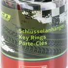 "Schlüsselanhänger, Key Rings, Porte-Clés" steht auf einer Verpackung mit Reifenmuster und rotem Brunnen-Logo.