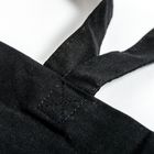 Eine schwarze Stofftasche mit robusten Trägern und sichtbaren Nähten auf weißem Hintergrund.