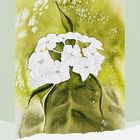 Text: "Trocken-in-Nass-Technik". Aquarellillustration einer weißen Blume mit grünen Blättern auf grünem Hintergrund.