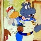 Zwei fröhliche, anthropomorphe Tiere. Ein Nilpferd in Uniform mit Blumen, ein Vogel mit Brautkleid und Kranz. Farbenfroh.