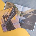 Text: "Reaching Across the Sky: A Celebration of Bridges", "A bridge is a safe path." Illustration von Brücken und Natur.