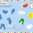 "Making pairs" Text oben. Verschiedene Objekte wie Kleidung, Toilettenpapier und Figuren auf buntem Hintergrund.