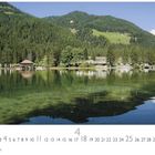 "Toblacher See" oben links, Monatskalender in der Mitte, darunter "CASARES EDITION". See mit Wald und Bergen im Hintergrund.