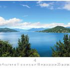 Panorama, Arona. Casares Edition. Kalender mit Blick auf einen See, umgeben von grünen Hügeln und blauem Himmel.