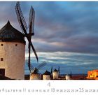 "La Mancha", Zahlenreihe 1-30, "CASARES EDITION". Windmühlen vor bewölktem Himmel und beleuchtetem Gebäude.