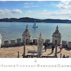 "Lissabon, Am Torre Belem." Blick von einer alten Steinfestung auf ein ruhiges Gewässer mit einem Segelboot. Menschen spazieren.