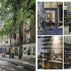 Texte: "COFFEE HOUSE", "VERTICE". Eine charmante, grüne Straße mit Cafés und Geschäften, einigen Menschen.