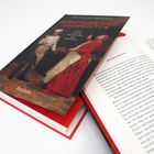 "HERDFEUER UND HOCHKULTUR" auf dem Buchcover. Geöffnetes Buch daneben, roter Rand.