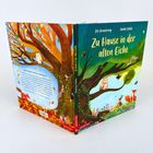 Titel: "Zu Hause in der alten Eiche". Vorder- und Rückseite eines Buches, illustriert mit Tieren auf einem Baum.