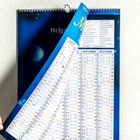 Kalender mit Monaten November und Dezember, plus Tabelle günstiger Tage. Eine Hand blättert die Januar-Seite um.