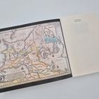 Rechts steht "Richard Swan - Grave Empire". Links eine Landkarte mit farbigen Grenzen, alten Schriftarten und einem Kompass.
