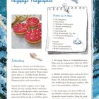 „Ungiftige Fliegenpilze“, Rezept für 16 Stück mit Zutatenliste und Anleitung. Bild: Muffins mit roter Glasur und weißen Perlen.
