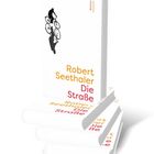 Ein Roman von Robert Seethaler, "Die Strasse". Geschlossene und geöffnete Buchansicht, zwei Radfahrer-Silhouetten auf dem Cover.