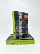 "Christian Berkel Sputnik" steht auf einem Buchcover. "SPIEGEL Bestseller" Sticker. Schwarz-weiß Foto eines jungen Mannes.