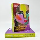 "Das erste Licht des Sommers" von Daniela Raimondi. Cover zeigt ein buntes Porträt. Verlag: Ullstein.