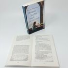 "Buch: Martin Ehrenhauser, 'Unsere Suche nach Zärtlichkeit'. Neben dem Buch liegt eine geöffnete Seite mit Text."