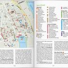 Links: Karte der "Hanoi-Altstadt" mit Sehenswürdigkeiten, Essen und Trinken sowie Übernachtungsmöglichkeiten. Rechts: Text über Geschichte von Hanoi, einschließlich Architektur und Geschichte der Gassen.
