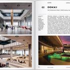 **DOKK1**  
Hack Kampmanns Plads 2, 8000 Aarhus Centrum, Dänemark  
Ein modernes Gebäude mit großen Fenstern, hellem Interieur und abendlicher Außenansicht.